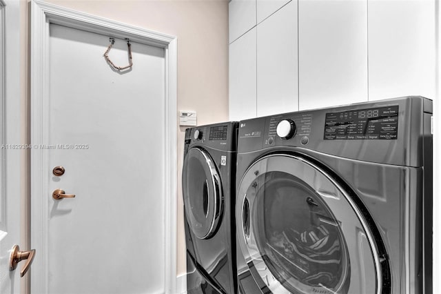 321 NW 100th Ave, Plantation, FL 33324 - laundry area with cabinet space and washer and dryer