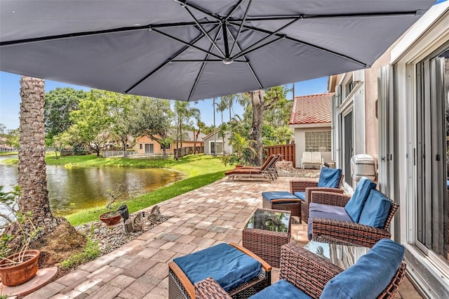 321 NW 100th Ave, Plantation, FL 33324 - view of patio featuring a water view and an outdoor hangout area