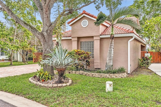 321 NW 100th Ave, Plantation, FL 33324 - mediterranean / spanish-style home featuring a tiled roof and stucco siding