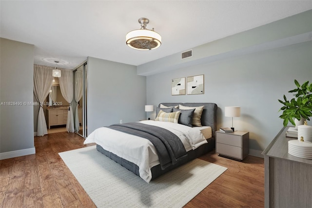 9112A SW 20th St, Davie, FL 33324 - bedroom with baseboards and wood finished floors