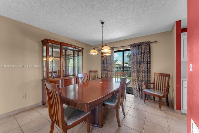 13420 SW 53rd St, Miami, FL 33175 - dining space featuring a textured ceiling and light tile patterned floors