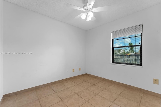 13420 SW 53rd St, Miami, FL 33175 - unfurnished room with a textured ceiling, light tile patterned floors, and ceiling fan