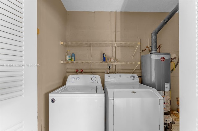 13420 SW 53rd St, Miami, FL 33175 - laundry area featuring washing machine and dryer, water heater, and concrete block wall