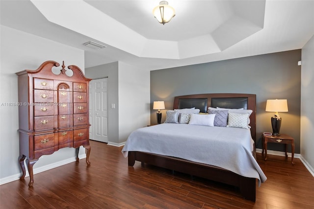 2406 SW 162nd Ter, Miramar, FL 33027 - bedroom with a tray ceiling and wood finished floors