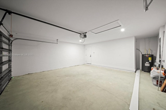 1301 NE 36th Ln, Cape Coral, FL 33909 - garage featuring electric water heater, a garage door opener, and recessed lighting