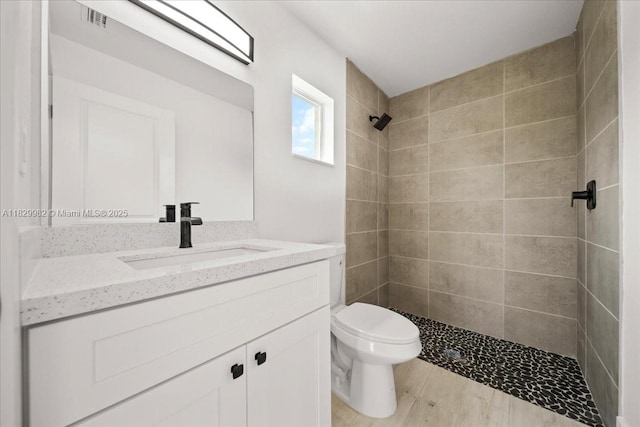 1301 NE 36th Ln, Cape Coral, FL 33909 - full bath featuring vanity and a tile shower
