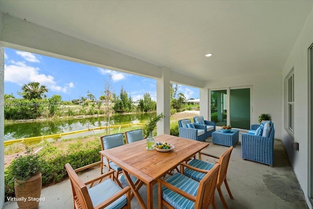 1301 NE 36th Ln, Cape Coral, FL 33909 - view of patio featuring a water view and outdoor lounge area