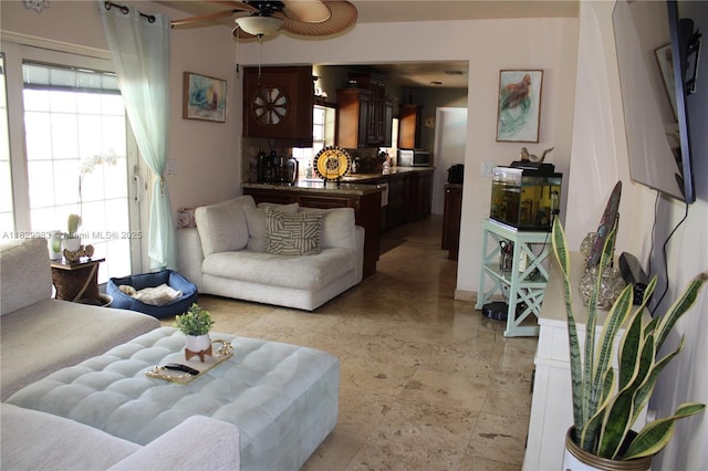 8200 SW 164th St, Palmetto Bay, FL 33157 - living room featuring ceiling fan and healthy amount of natural light