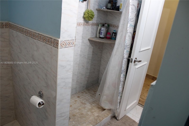 8200 SW 164th St, Palmetto Bay, FL 33157 - bathroom with tiled shower and tile walls