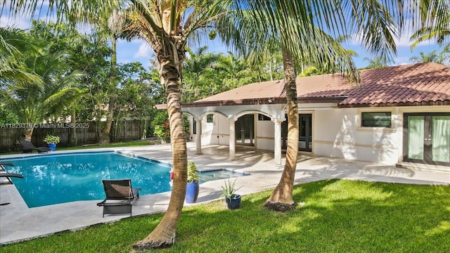 18301 SW 86th Ave, Palmetto Bay, FL 33157 - view of swimming pool with a patio area and french doors