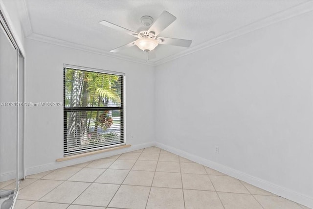 18301 SW 86th Ave, Palmetto Bay, FL 33157 - unfurnished room with crown molding, a textured ceiling, ceiling fan, and light tile patterned flooring