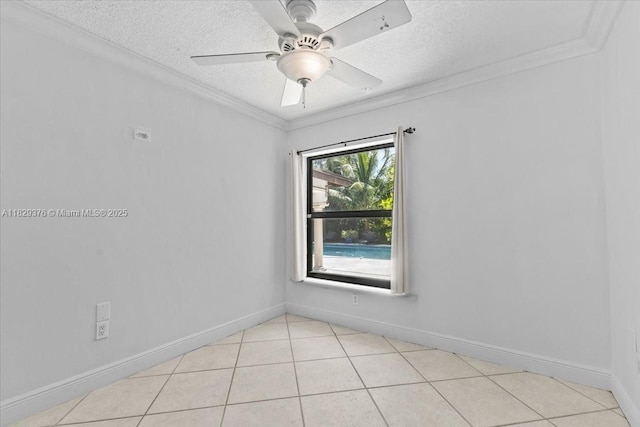 18301 SW 86th Ave, Palmetto Bay, FL 33157 - tiled spare room featuring ornamental molding, a textured ceiling, and a ceiling fan