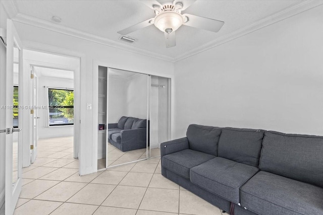 18301 SW 86th Ave, Palmetto Bay, FL 33157 - living room featuring light tile patterned flooring, crown molding, and a ceiling fan