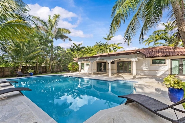 18301 SW 86th Ave, Palmetto Bay, FL 33157 - view of pool with french doors and a patio area