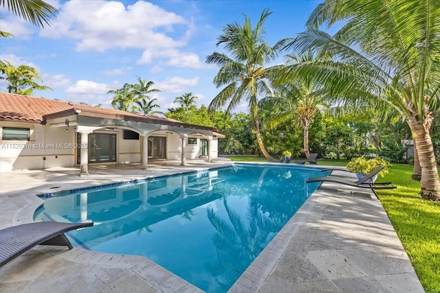 18301 SW 86th Ave, Palmetto Bay, FL 33157 - swimming pool featuring a patio area and a yard