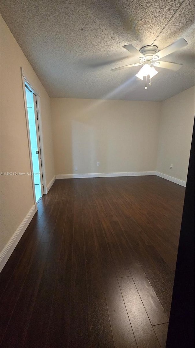7500 NW 17th St Unit 101, Plantation, FL 33313 - unfurnished room with dark wood-style flooring, ceiling fan, and a textured ceiling
