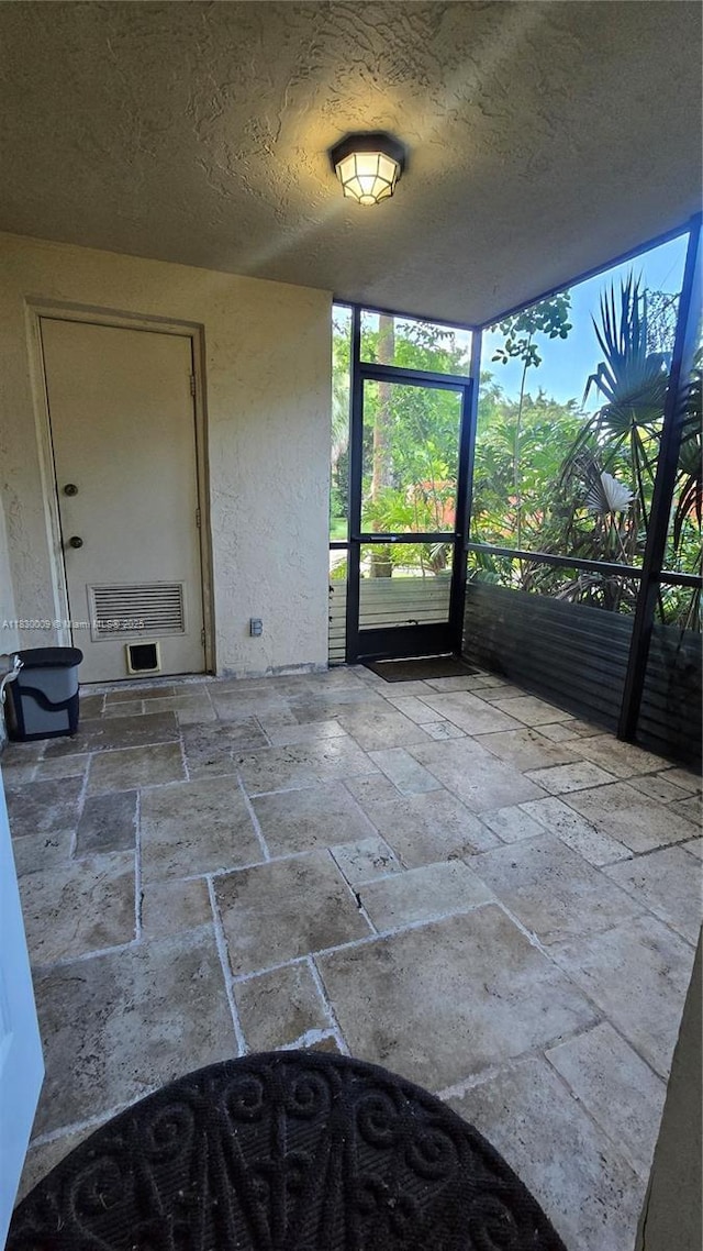 7500 NW 17th St Unit 101, Plantation, FL 33313 - unfurnished sunroom featuring plenty of natural light