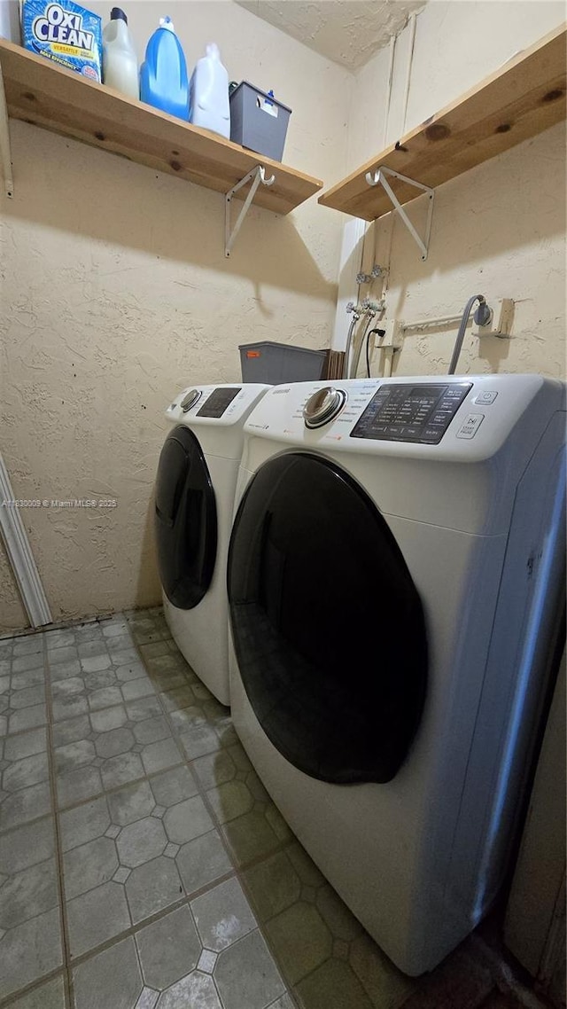 7500 NW 17th St Unit 101, Plantation, FL 33313 - laundry area with washing machine and dryer