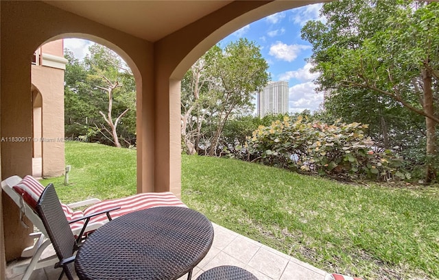 19655 E Country Club Dr Unit 6108, Aventura, FL 33180 - view of grassy yard featuring a patio