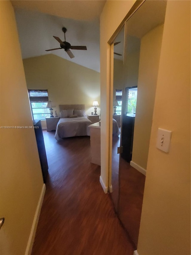 810 SW 113th Ter, Pembroke Pines, FL 33025 - hallway with healthy amount of natural light, wood finished floors, and vaulted ceiling