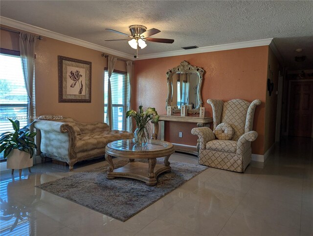 11024 SW 157th Ter, Miami, FL 33157 - living area featuring ceiling fan, crown molding, and a textured ceiling