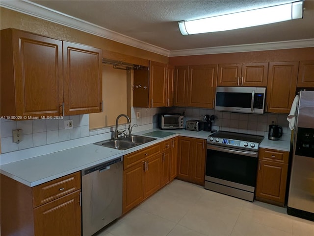 11024 SW 157th Ter, Miami, FL 33157 - kitchen featuring stainless steel appliances, brown cabinets, light countertops, crown molding, and decorative backsplash