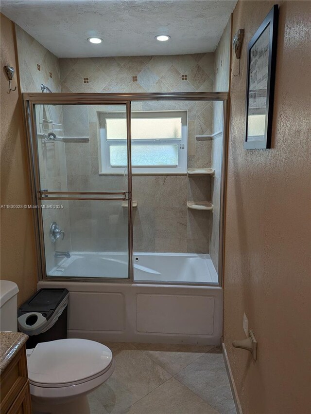 11024 SW 157th Ter, Miami, FL 33157 - full bath featuring combined bath / shower with glass door, vanity, and tile patterned flooring