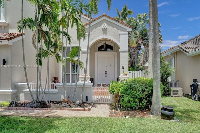 5347 SW 32nd Ter, Hollywood, FL 33312 - property entrance featuring stucco siding, a gate, and a tile roof