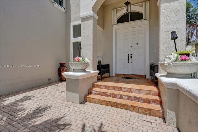 5347 SW 32nd Ter, Hollywood, FL 33312 - doorway to property with stucco siding