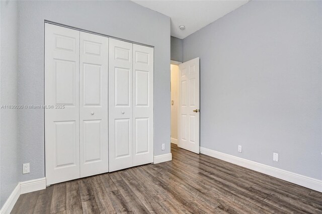 5347 SW 32nd Ter, Hollywood, FL 33312 - unfurnished bedroom featuring wood finished floors and a closet