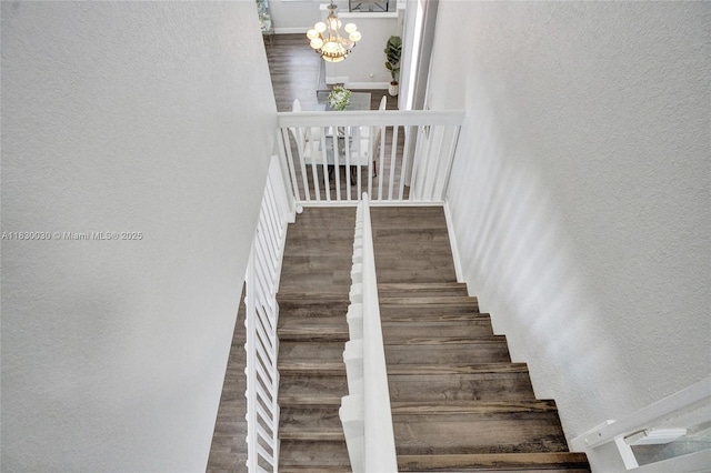 5347 SW 32nd Ter, Hollywood, FL 33312 - stairs with a chandelier and a textured wall