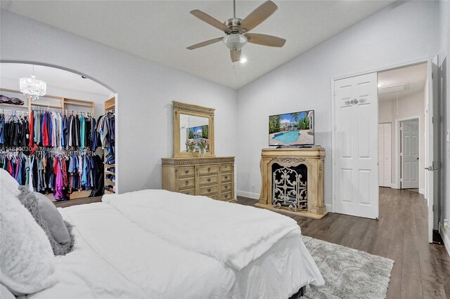 5347 SW 32nd Ter, Hollywood, FL 33312 - bedroom featuring vaulted ceiling, arched walkways, wood finished floors, and a ceiling fan