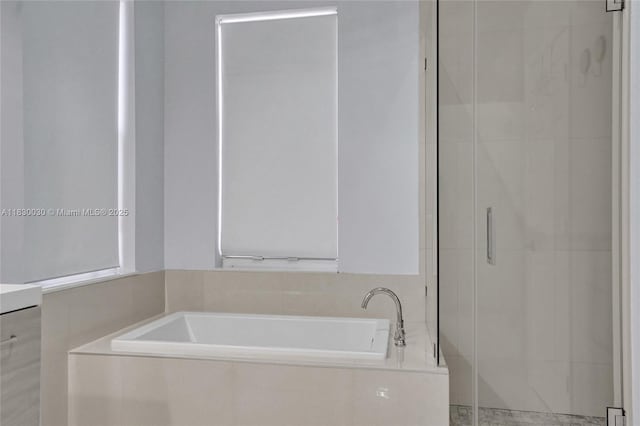 5347 SW 32nd Ter, Hollywood, FL 33312 - bathroom featuring a stall shower and a bath