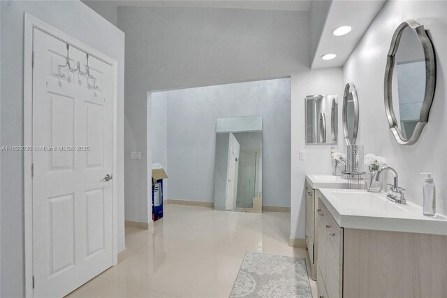 5347 SW 32nd Ter, Hollywood, FL 33312 - full bath with double vanity, recessed lighting, and tile patterned floors