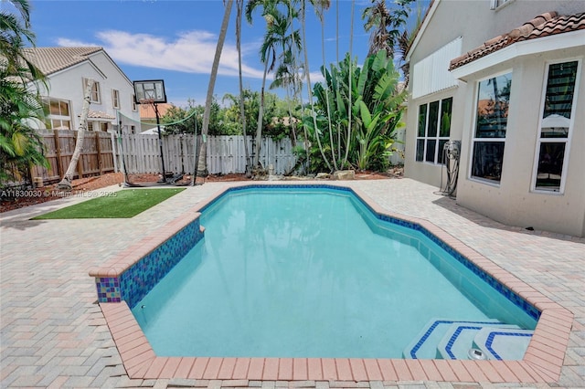 5347 SW 32nd Ter, Hollywood, FL 33312 - view of swimming pool featuring a patio area and a fenced backyard