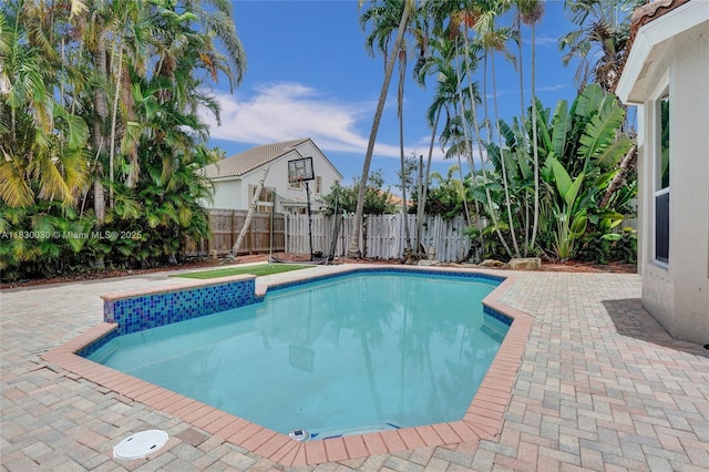 5347 SW 32nd Ter, Hollywood, FL 33312 - view of swimming pool featuring a fenced backyard and a patio