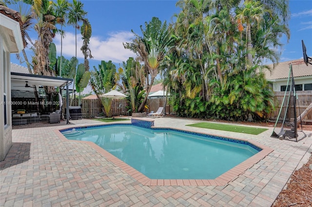 5347 SW 32nd Ter, Hollywood, FL 33312 - view of pool featuring a patio area, a fenced backyard, and ceiling fan
