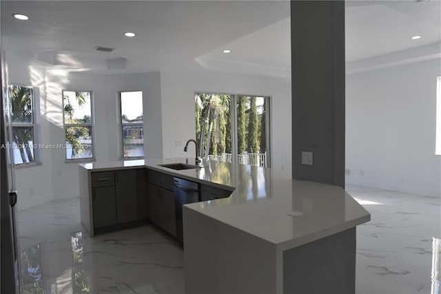 2925 SW 133rd Ave, Miramar, FL 33027 - kitchen featuring recessed lighting, light countertops, light marble finish floors, stainless steel dishwasher, and modern cabinets