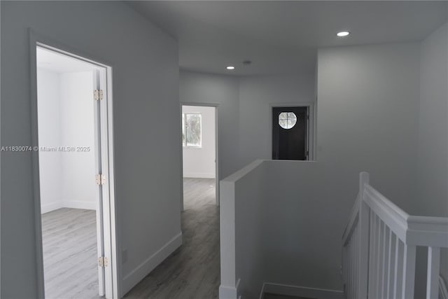 2925 SW 133rd Ave, Miramar, FL 33027 - corridor with an upstairs landing, wood finished floors, and recessed lighting