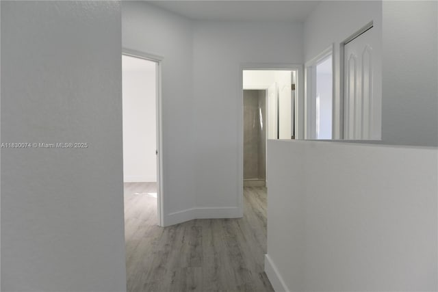 2925 SW 133rd Ave, Miramar, FL 33027 - hall featuring wood finished floors and baseboards