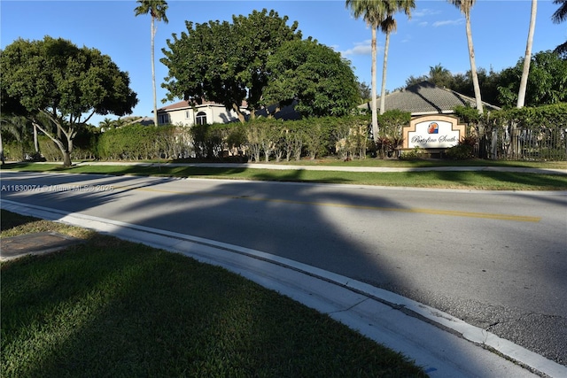 2925 SW 133rd Ave, Miramar, FL 33027 - view of asphalt road with curbs and sidewalks