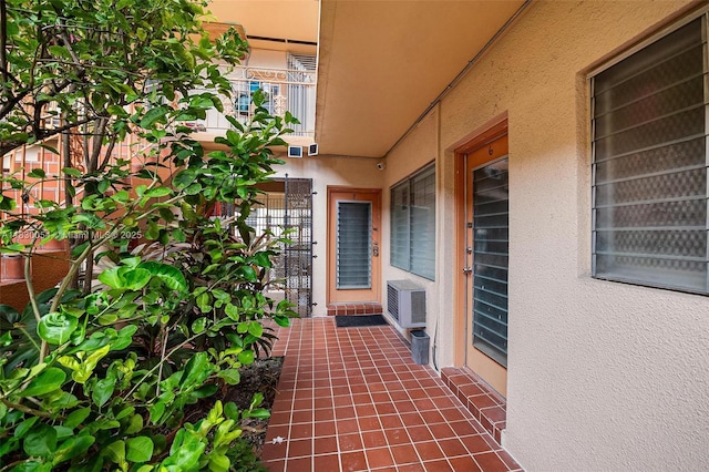 1060 Pennsylvania Ave Unit 7, Miami Beach, FL 33139 - entrance to property featuring stucco siding and an AC wall unit