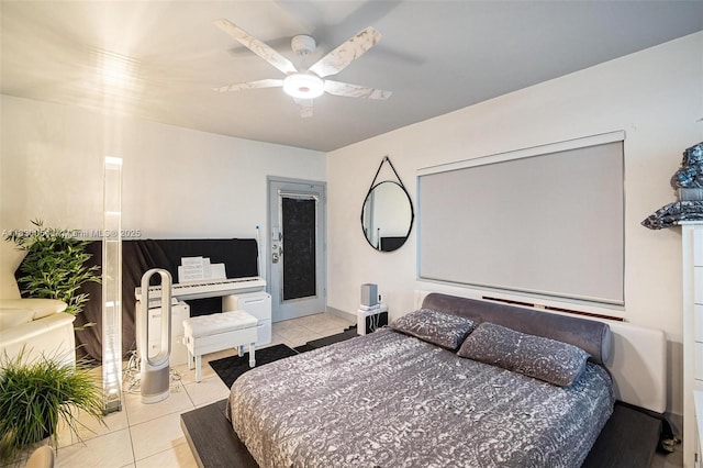 1060 Pennsylvania Ave Unit 7, Miami Beach, FL 33139 - tiled bedroom featuring a ceiling fan and baseboards