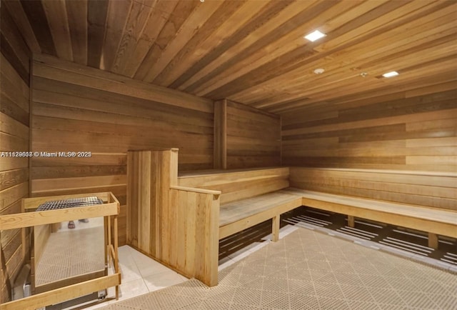 500 Three Islands Blvd Unit 320, Hallandale Beach, FL 33009 - sauna / steam room with wooden walls, wooden ceiling, and tile patterned flooring