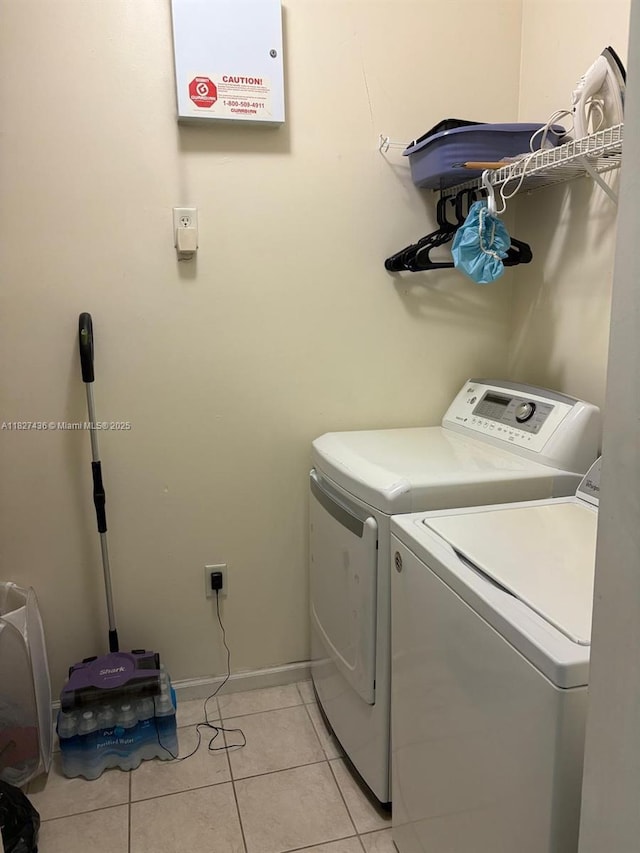 4506 SW 160th Ave Unit 1118, Miramar, FL 33027 - washroom with washer and dryer and light tile patterned floors