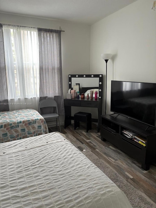 4506 SW 160th Ave Unit 1118, Miramar, FL 33027 - bedroom featuring wood finished floors and multiple windows