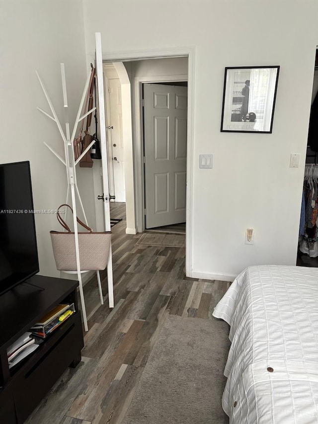 4506 SW 160th Ave Unit 1118, Miramar, FL 33027 - bedroom featuring wood finished floors and baseboards