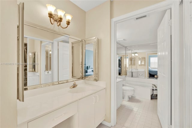 10217 NW 24th Pl Unit 310, Sunrise, FL 33322 - full bathroom featuring vanity, a chandelier, and tile patterned floors