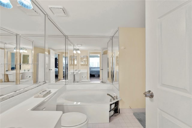 10217 NW 24th Pl Unit 310, Sunrise, FL 33322 - full bath with connected bathroom, tile patterned floors, a garden tub, and vanity
