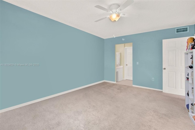 10217 NW 24th Pl Unit 310, Sunrise, FL 33322 - unfurnished bedroom with carpet, a textured ceiling, and ceiling fan